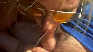 cheating blonde whore deepthroats cock outdoors for daytime facial?