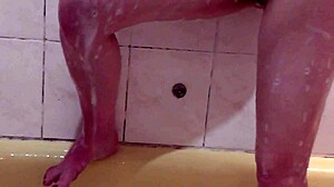 hey watch this cute brunette soak her pussy boobs and ass in bubbly bath