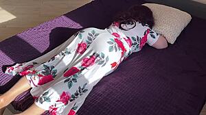 the stepmom stretches out on the bed as stepson sneaks in to interrupt her rest
