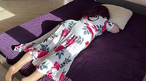the stepmom stretches out on the bed as stepson sneaks in to interrupt her rest