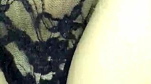 He slides into her tight ass while the buttplug stretches her wide