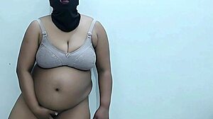 Chubby Indian babe Rohini strips big natural tits in homemade webcam chat