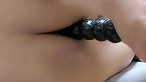 shemale ting fists anus wide with dildo and hand