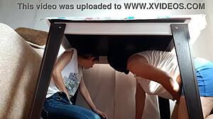 i sneak under the desk in my miniskirt and jeans to rub my wet pussy while stepparents eat nearby