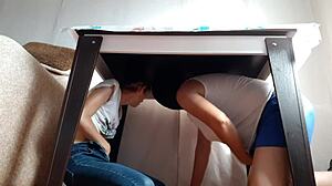 i sneak under the desk in my miniskirt and jeans to rub my wet pussy while stepparents eat nearby