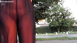 Hairy chubby mature flashes beaver through see-through outfit outdoors publicly