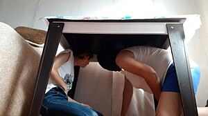 i sneak under the desk in my miniskirt and jeans to rub my wet pussy while stepparents eat nearby