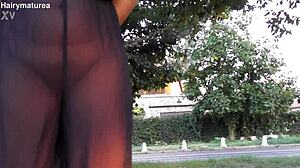 Hairy chubby mature flashes beaver through see-through outfit outdoors publicly