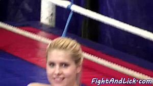 What happens backstage when an Asian lezzie grabs a wrestling beauty for strapon action?