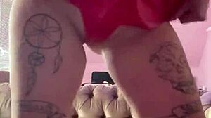 check out mistress katy's leather boots and big tits in bdsm solo