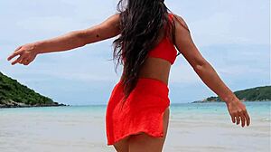 i flash my petite body in orange bikini dancing and fingering on the beach public fun