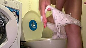 wet student sneaks pussy play and piss in toilet