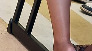 light skinned ebony teen's smooth soles caught candid in hidden foot tease
