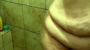 check out this curvy bbw wife soaping her big ass in the shower part 2