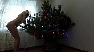 Bitch shakes small tits ass pussy dancing wild around christmas tree solo