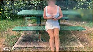 wife flashes shaved pussy and big tits swinging panty-free outdoors