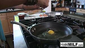 Kitchen tempts with brunette milf's big tits swaying during intimate play.