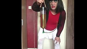 sissy crossdresser begs shyly for piss filling his tube to swallow every drop homemade