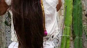 Petite brunette flashes pussy in tight white jeans outdoors teasing neighbors