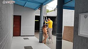 Naked hosts tease visitor in garage surprise