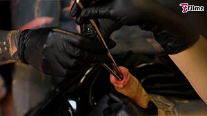 three latex goddesses wreck tattoo slave's cock with brutal urethral fingering sounding