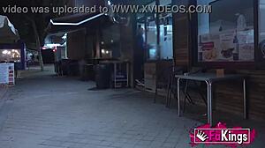 that harley quinn cosplayer in the street sure knows how to tease with her bent over moves.