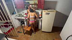 Hidden cam films slut wife getting horny during kitchen clean turns into lesbian fornication frenzy