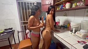 Hidden cam films slut wife getting horny during kitchen clean turns into lesbian fornication frenzy