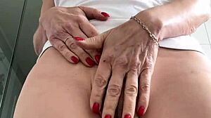 Baby oil drenches wet t-shirt clinging to oiled big clit pussy and natural tits