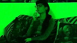 beth kinky sexy goth domina smokes cigarette in green light hd pt1!