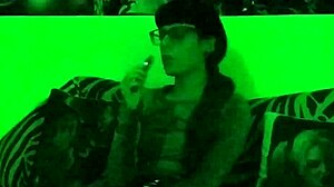 beth kinky sexy goth domina smokes cigarette in green light hd pt1!