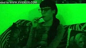 beth kinky sexy goth domina smokes cigarette in green light hd pt1!