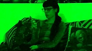 beth kinky sexy goth domina smokes cigarette in green light hd pt1!