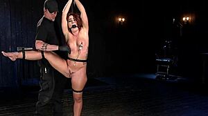 shackled redhead slave slut bound choked gagged deepthroats dildo whipped anal toy fucked