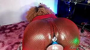 Red-Clad African Bunz Stuffs Dildo Deep In Tight Asshole Collection